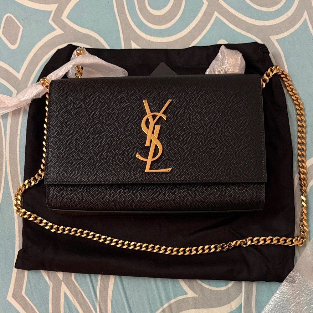 Saint Laurent Black Clutch with Gold Logo